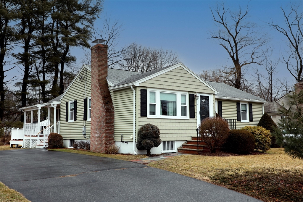 10 Wayland Road Wakefield, MA 01880 - Photo 1 of 28 a view of a house with a yard covered in snow