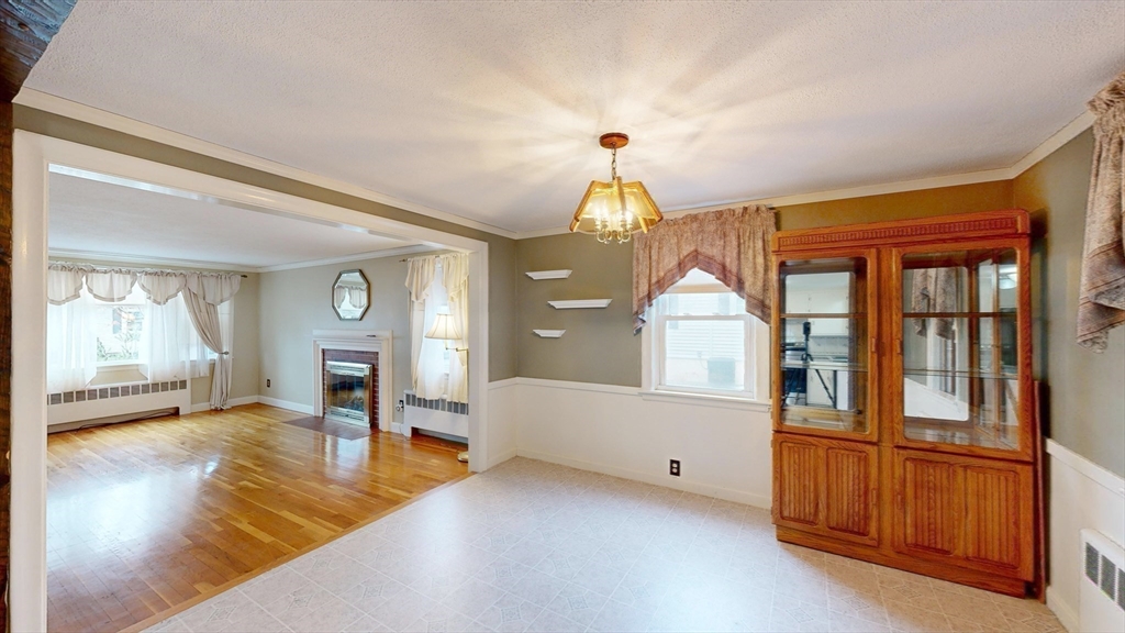 10 Wayland Road Wakefield, MA 01880 - Photo 11 of 28 a view of a living room and entryway