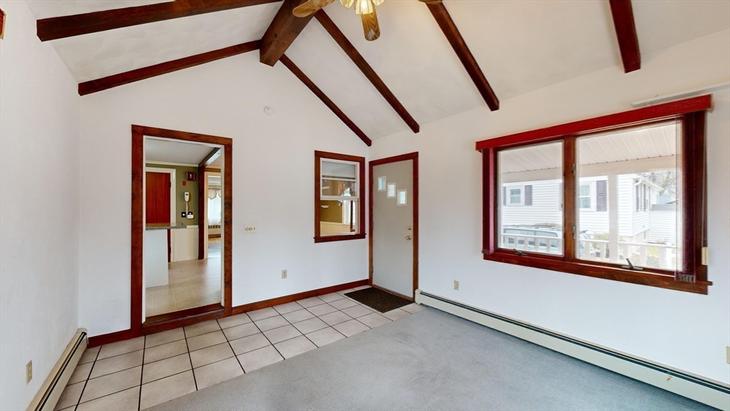 10 Wayland Road Wakefield, MA 01880 - Photo 14 of 28 a view of an empty room with a window