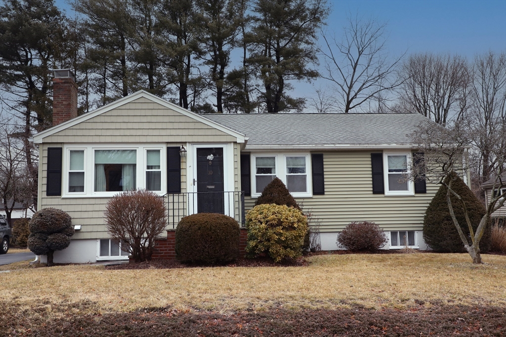 10 Wayland Road Wakefield, MA 01880 - Photo 2 of 28 a view of a house with a yard covered in snow