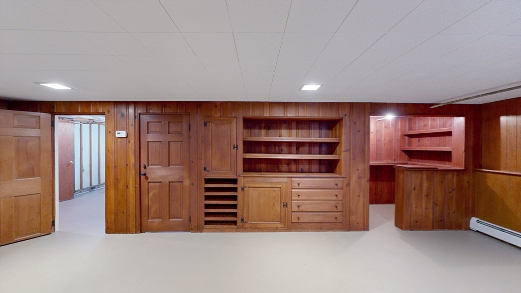 10 Wayland Road Wakefield, MA 01880 - Photo 22 of 28 a view of an empty walk in closet