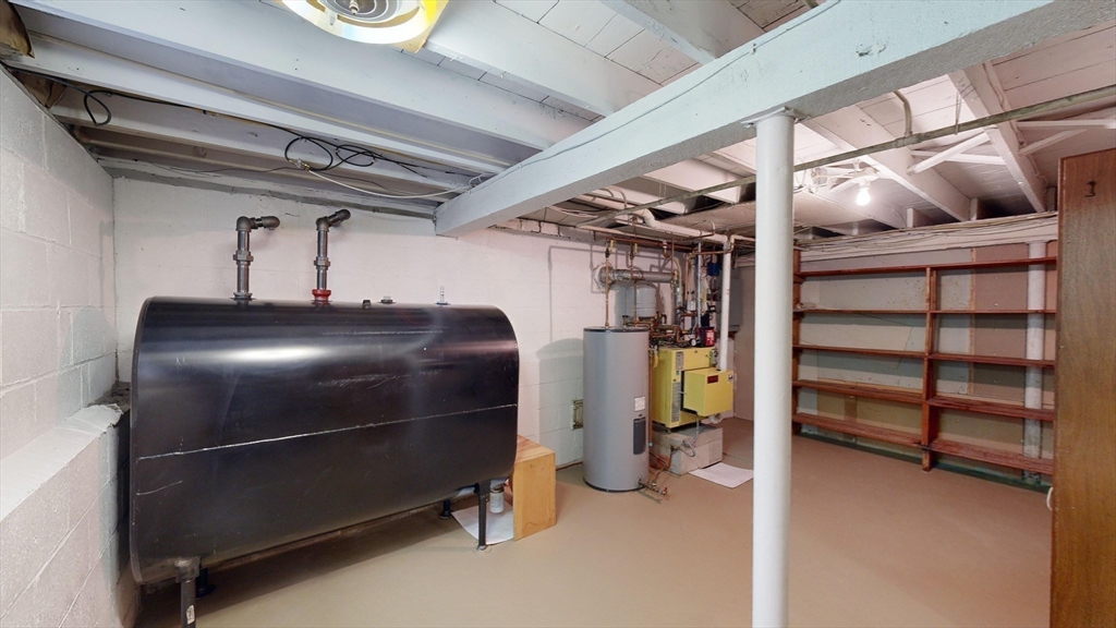 10 Wayland Road Wakefield, MA 01880 - Photo 25 of 28 a room with storage and utility