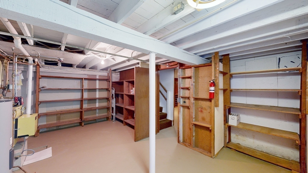 10 Wayland Road Wakefield, MA 01880 - Photo 26 of 28 a view of walk in closet with empty racks