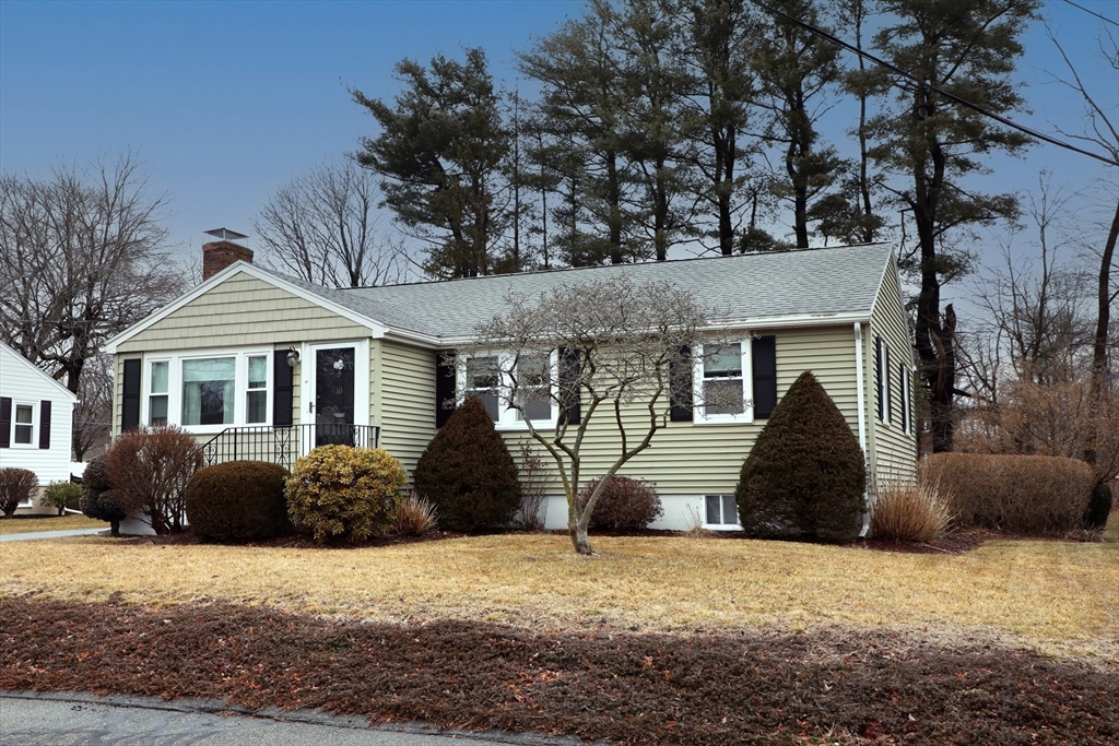 10 Wayland Road Wakefield, MA 01880 - Photo 3 of 28 a front view of a house with a yard