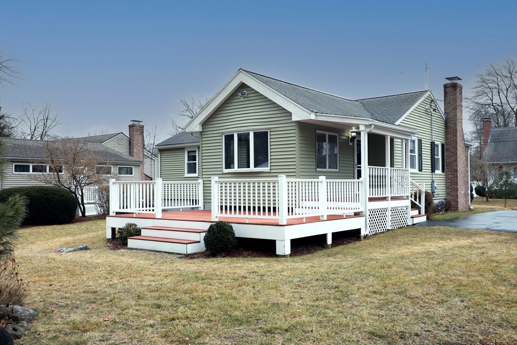 10 Wayland Road Wakefield, MA 01880 - Photo 4 of 28 a house view with a backyard space