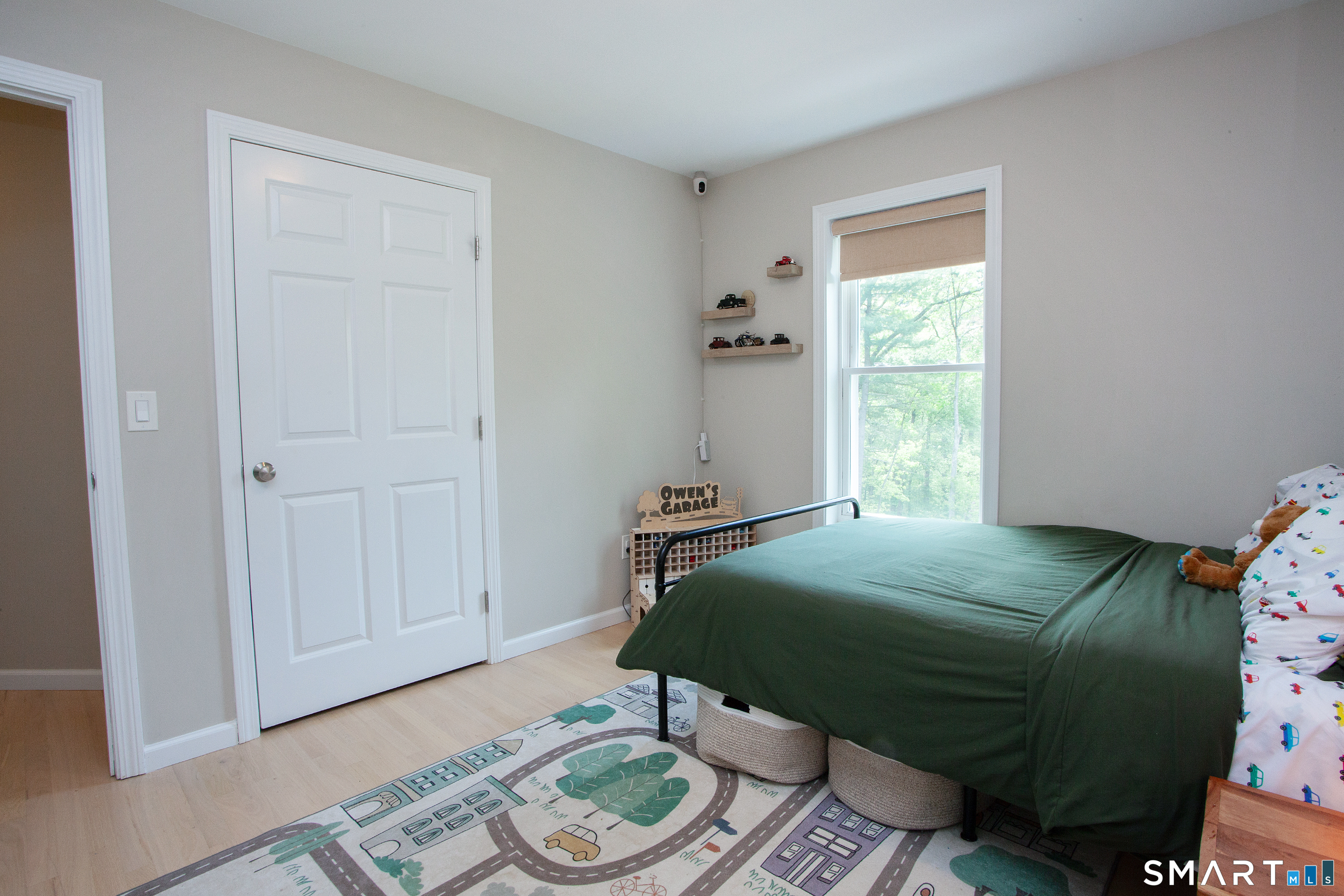 93 Rye Hill Circle Somers, CT 06071 - Photo 23 of 33 a bedroom with a bed and a window