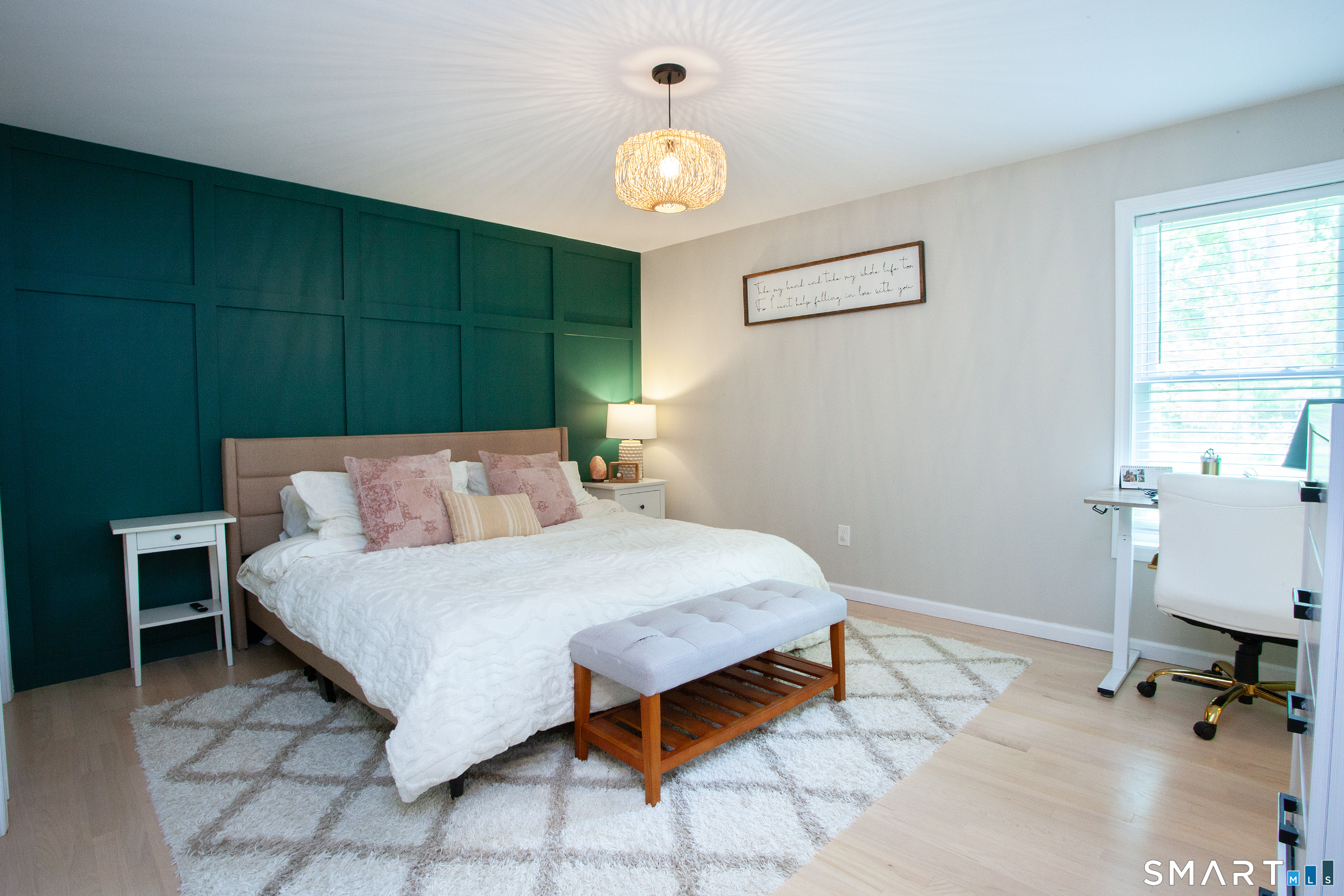 93 Rye Hill Circle Somers, CT 06071 - Photo 25 of 33 a bedroom with a bed and a chandelier