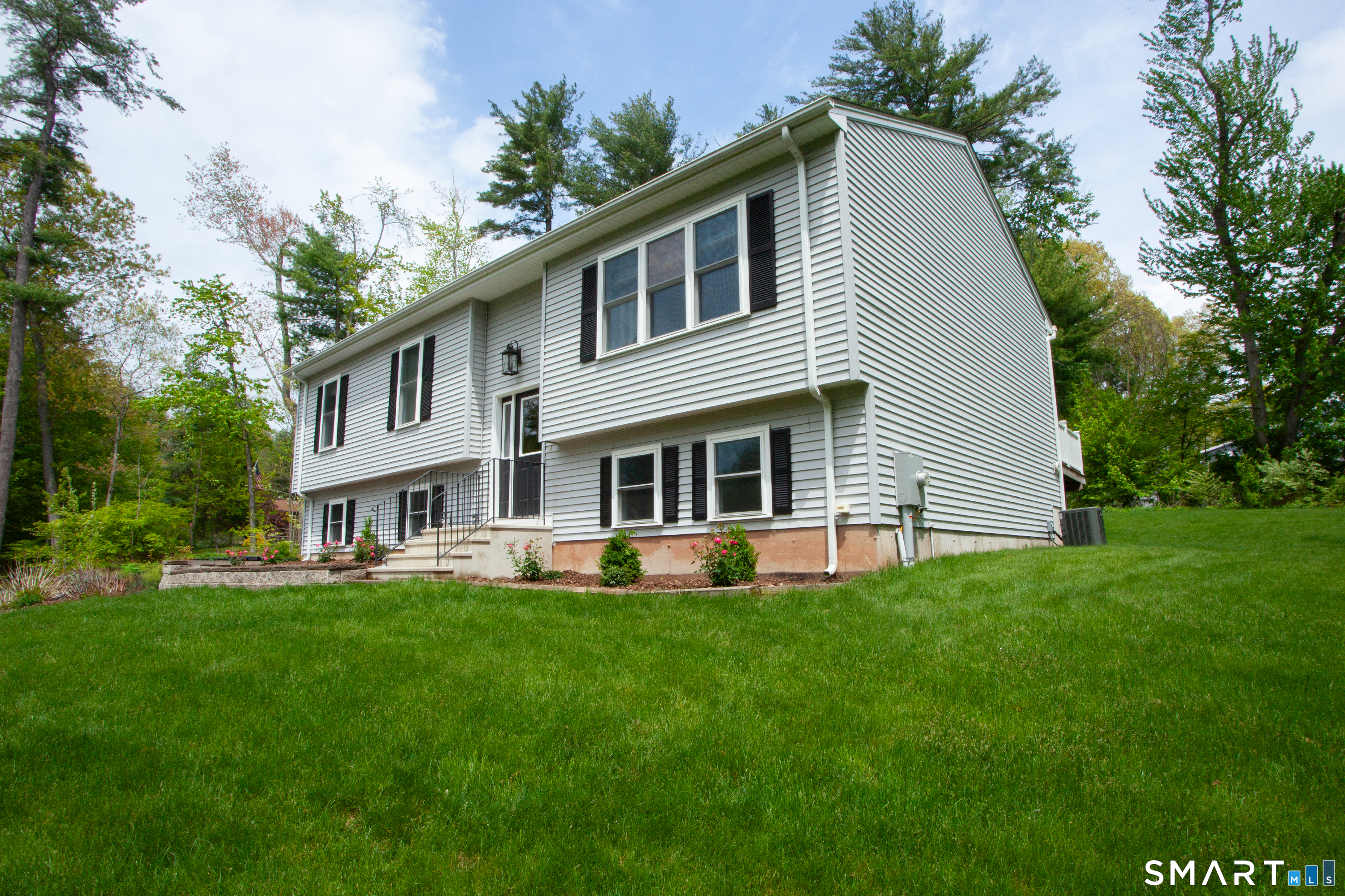 93 Rye Hill Circle Somers, CT 06071 - Photo 3 of 33 a front view of house with yard