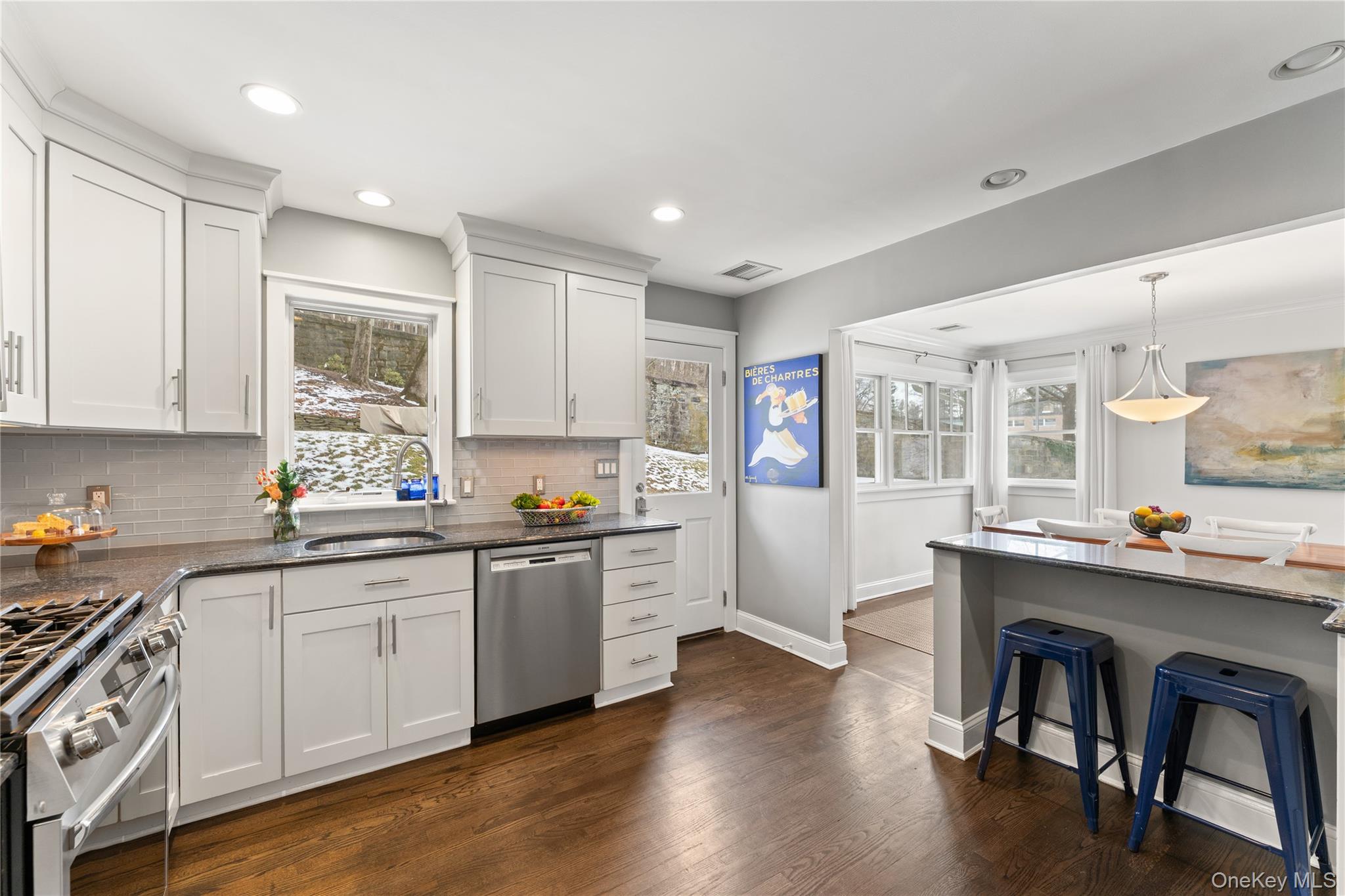 20 Riverview Road Irvington, NY 10533 - Photo 15 of 37 a kitchen with a sink cabinets and wooden floor