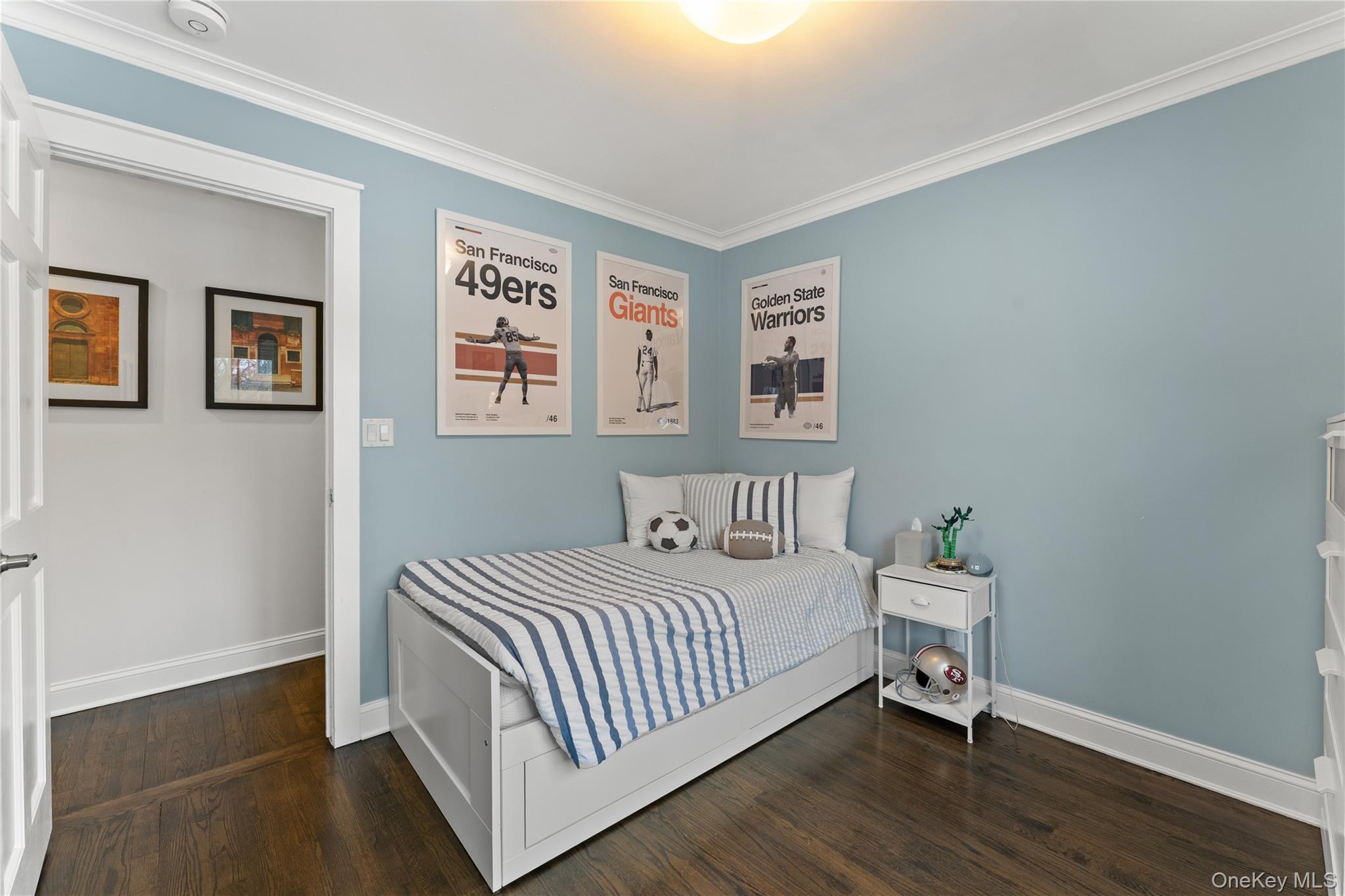 20 Riverview Road Irvington, NY 10533 - Photo 17 of 37 a bedroom with a bed and wooden floor