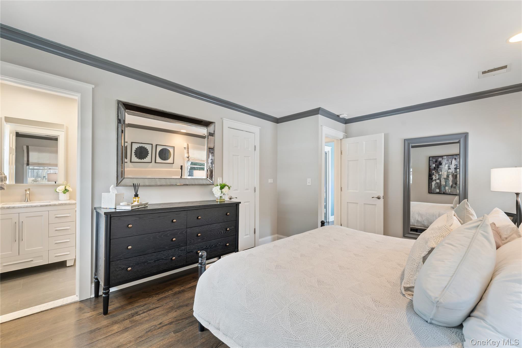 20 Riverview Road Irvington, NY 10533 - Photo 21 of 37 a bedroom with a bed and a dresser