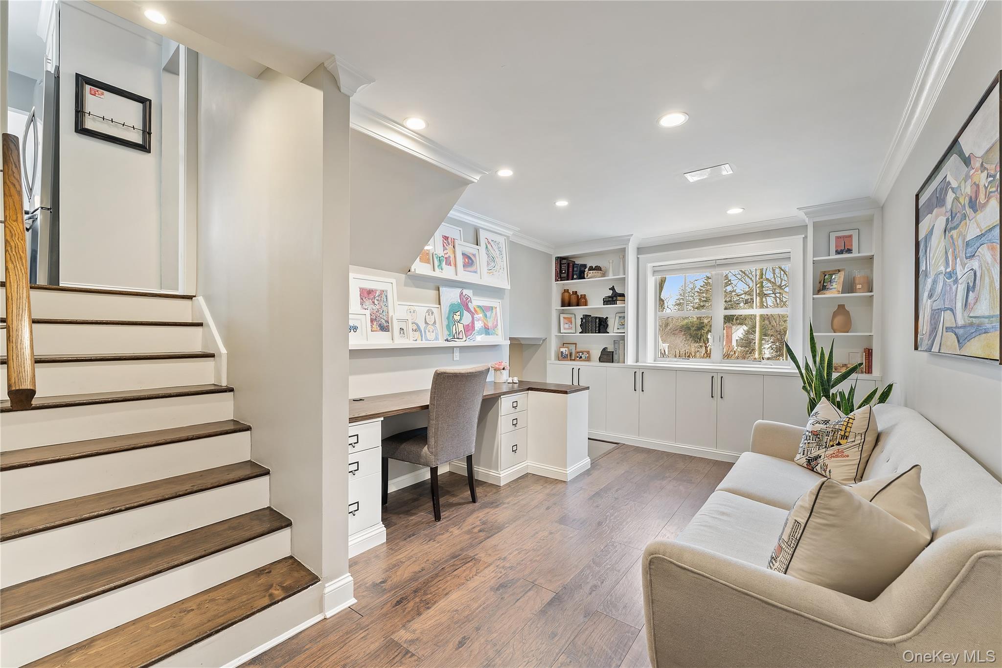 20 Riverview Road Irvington, NY 10533 - Photo 23 of 37 a living room with furniture and a wooden floor