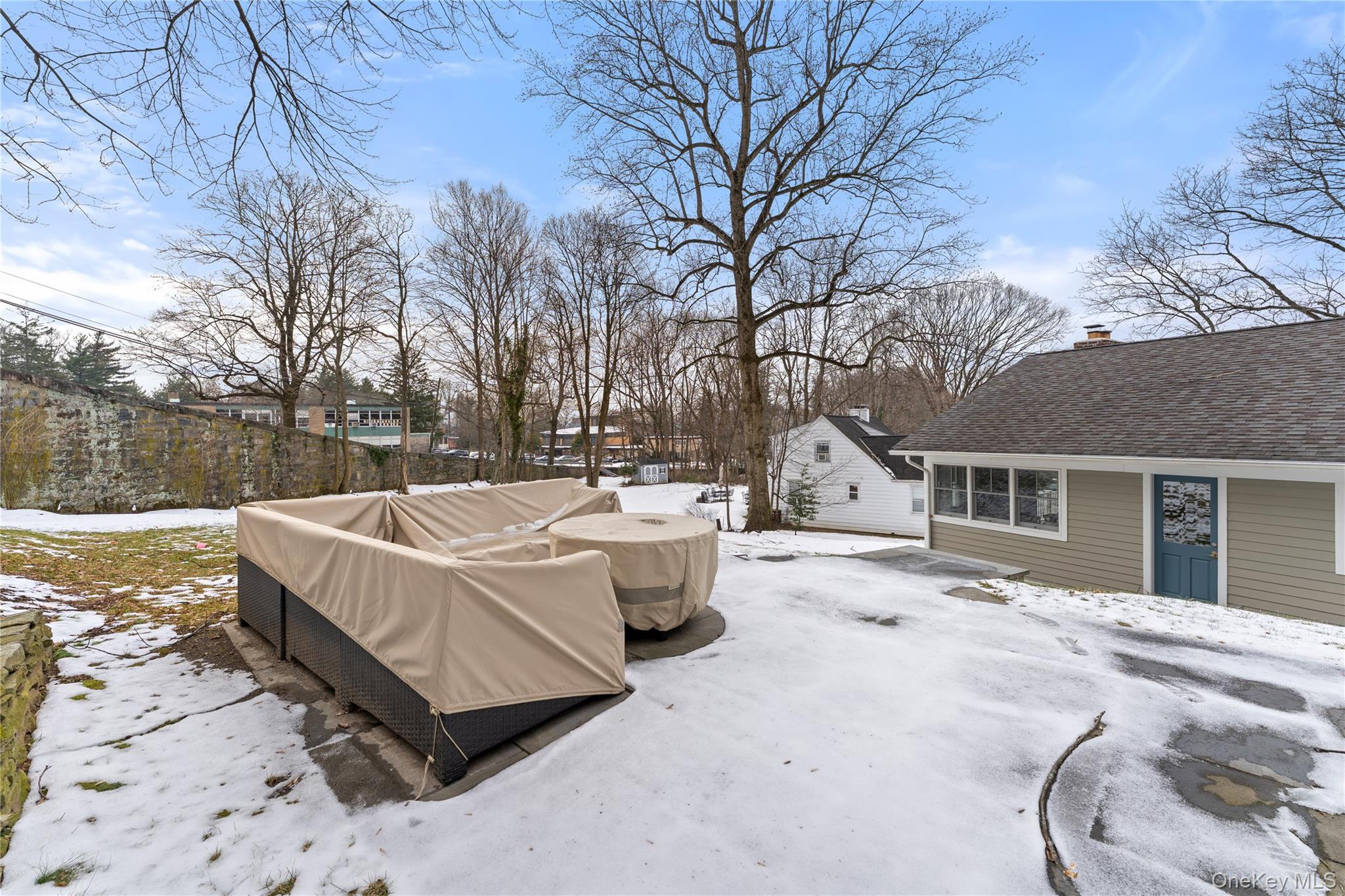 20 Riverview Road Irvington, NY 10533 - Photo 29 of 37 a view of a house with a yard covered in snow