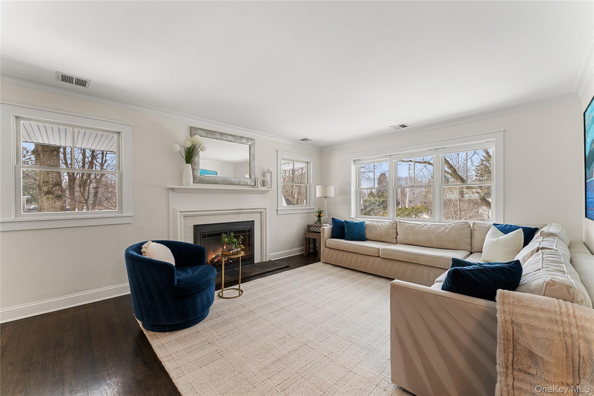 20 Riverview Road Irvington, NY 10533 - Photo 5 of 37 a living room with furniture and a fireplace