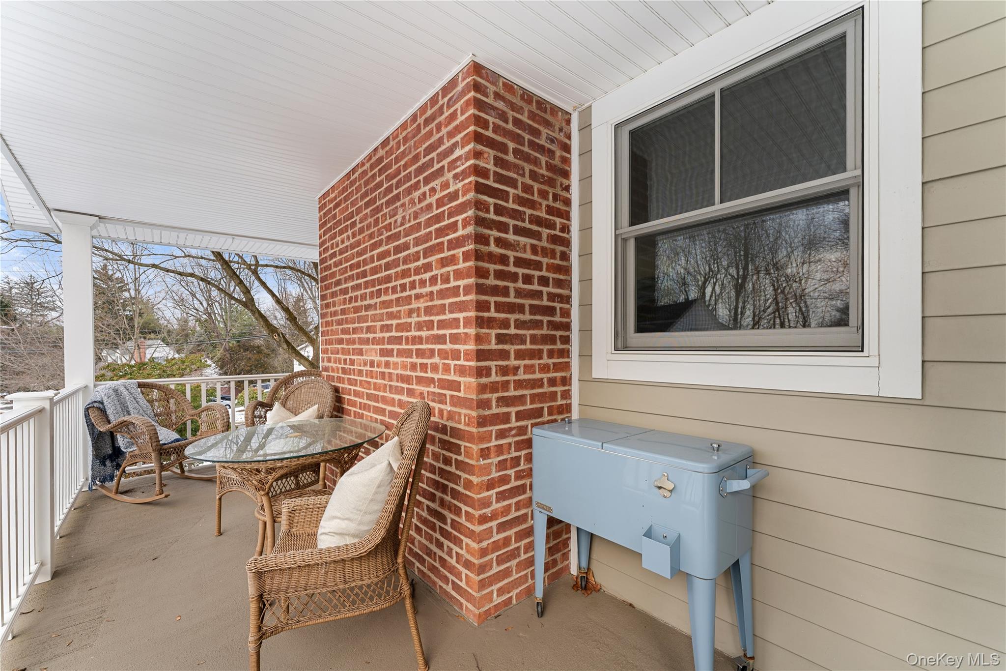20 Riverview Road Irvington, NY 10533 - Photo 8 of 37 a balcony with table and chairs