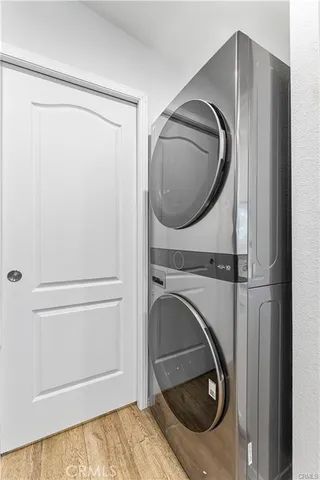 a close view of a utility room with washer and dryer