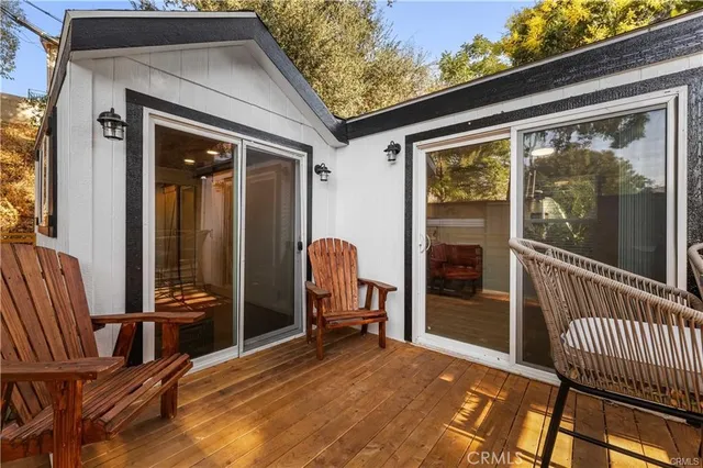 a view of a balcony and a barbeque