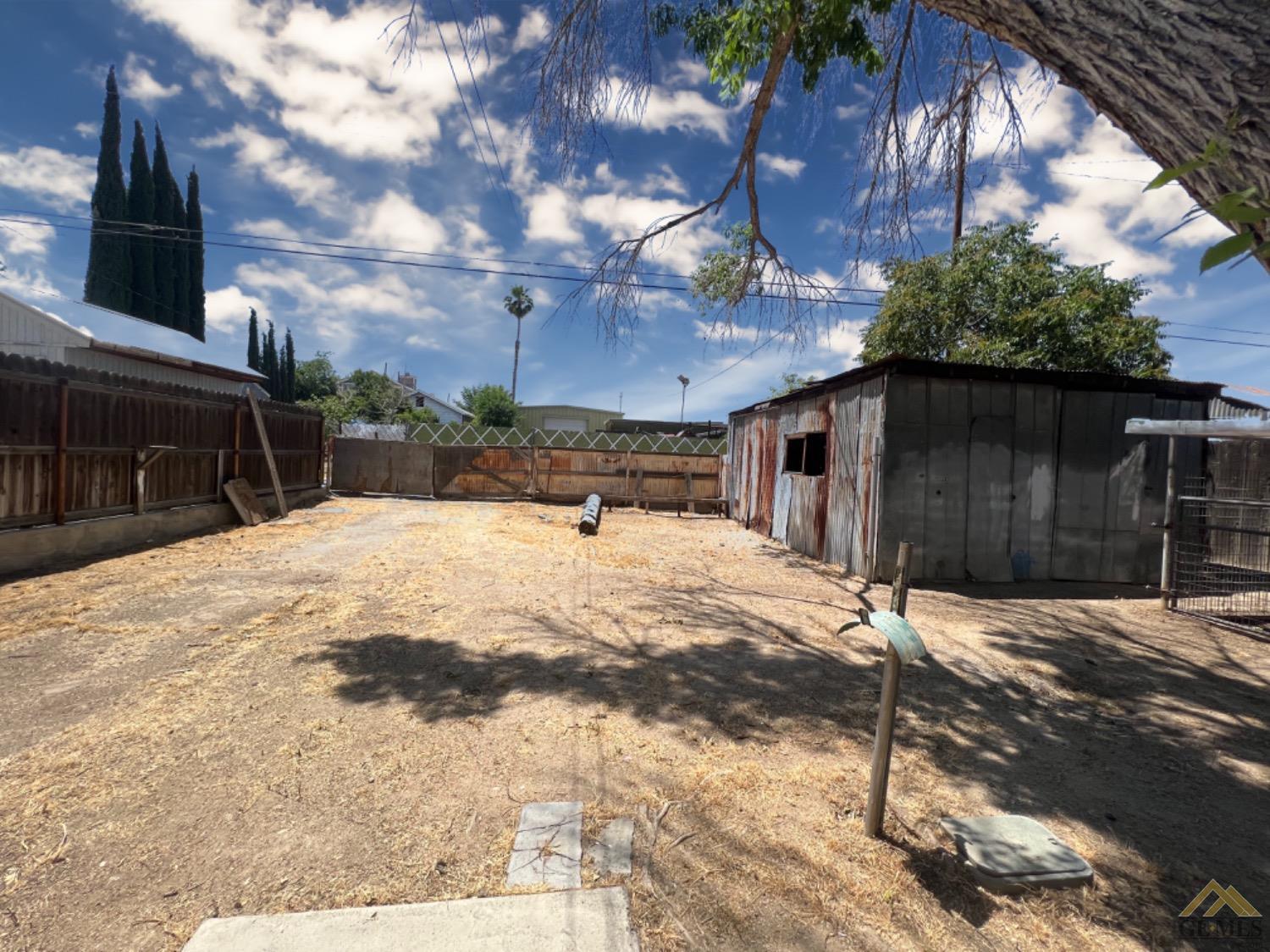 Undisclosed Address Taft, CA 93268 - Photo 14 of 18 a view of a backyard of the house