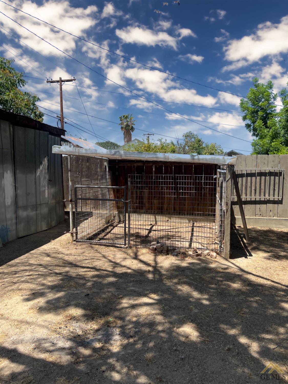 Undisclosed Address Taft, CA 93268 - Photo 18 of 18 a view of a backyard with a sitting area