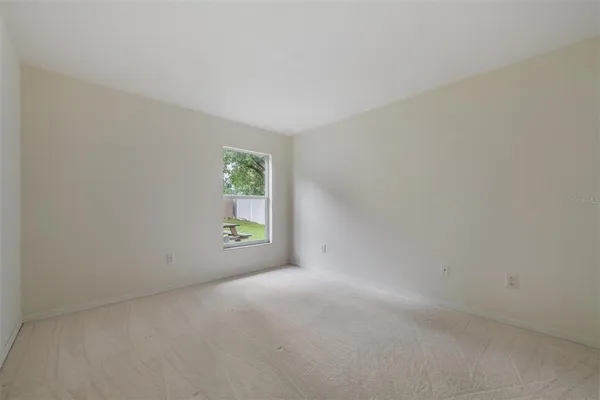 a view of an empty room with window