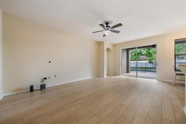 a view of room window and wooden floor