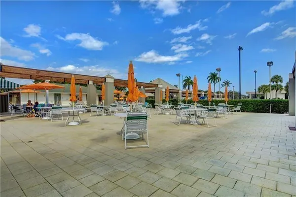 a view of a swimming pool with a lounge chairs