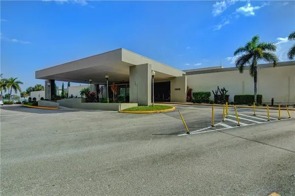 a view of swimming pool with tree s