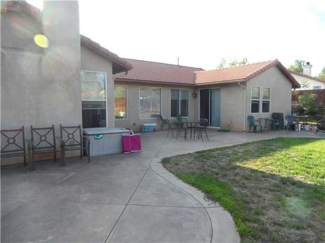 16807 Open View Road Ramona, CA 92065 - Photo 14 of 18 Plenty of patio area for entertaining or just backyard fun.