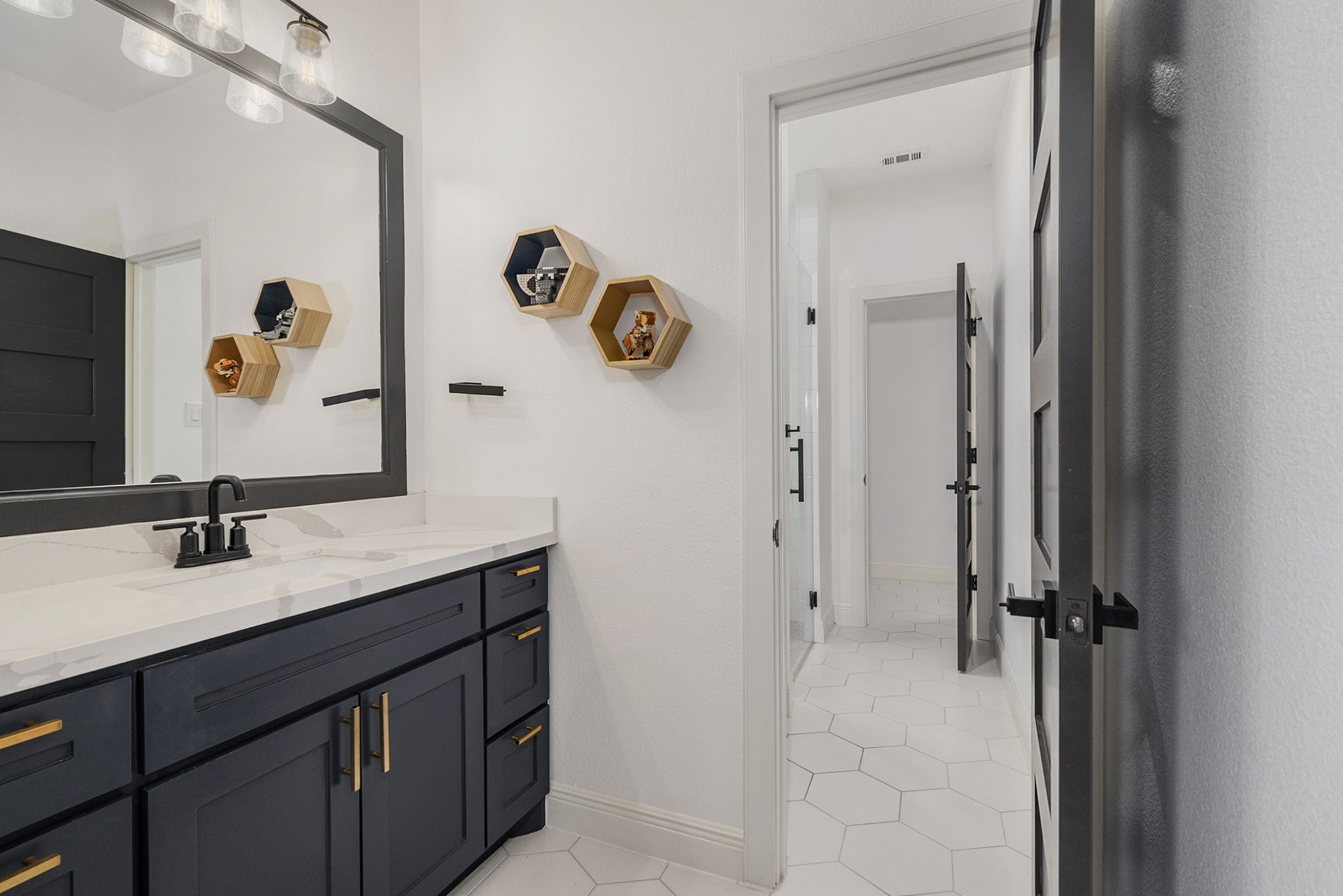 11211 Leonidas Horton Road Conroe, TX 77304 - Photo 22 of 47 Hollywood bathroom with ample storage space!