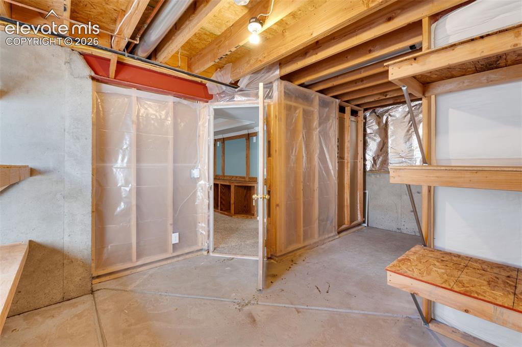 7840 Midnight Road Peyton, CO 80831 - Photo 39 of 48 The unfinished portion of the basement is prepped for a bathroom and offers great additional storage