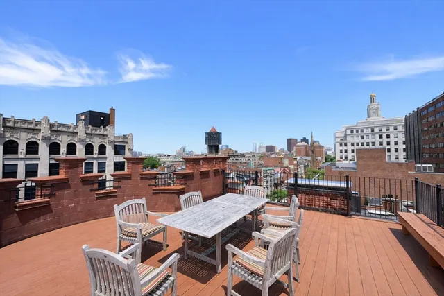 a view of a terrace with seating area