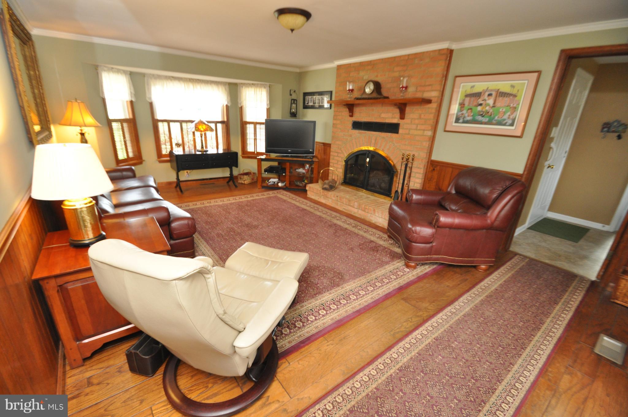 2412 Coon Club Road Westminster, MD 21157 - Photo 5 of 28 FAMILY ROOM JUST OFF KITCHEN W/ GAS FIREPLACE