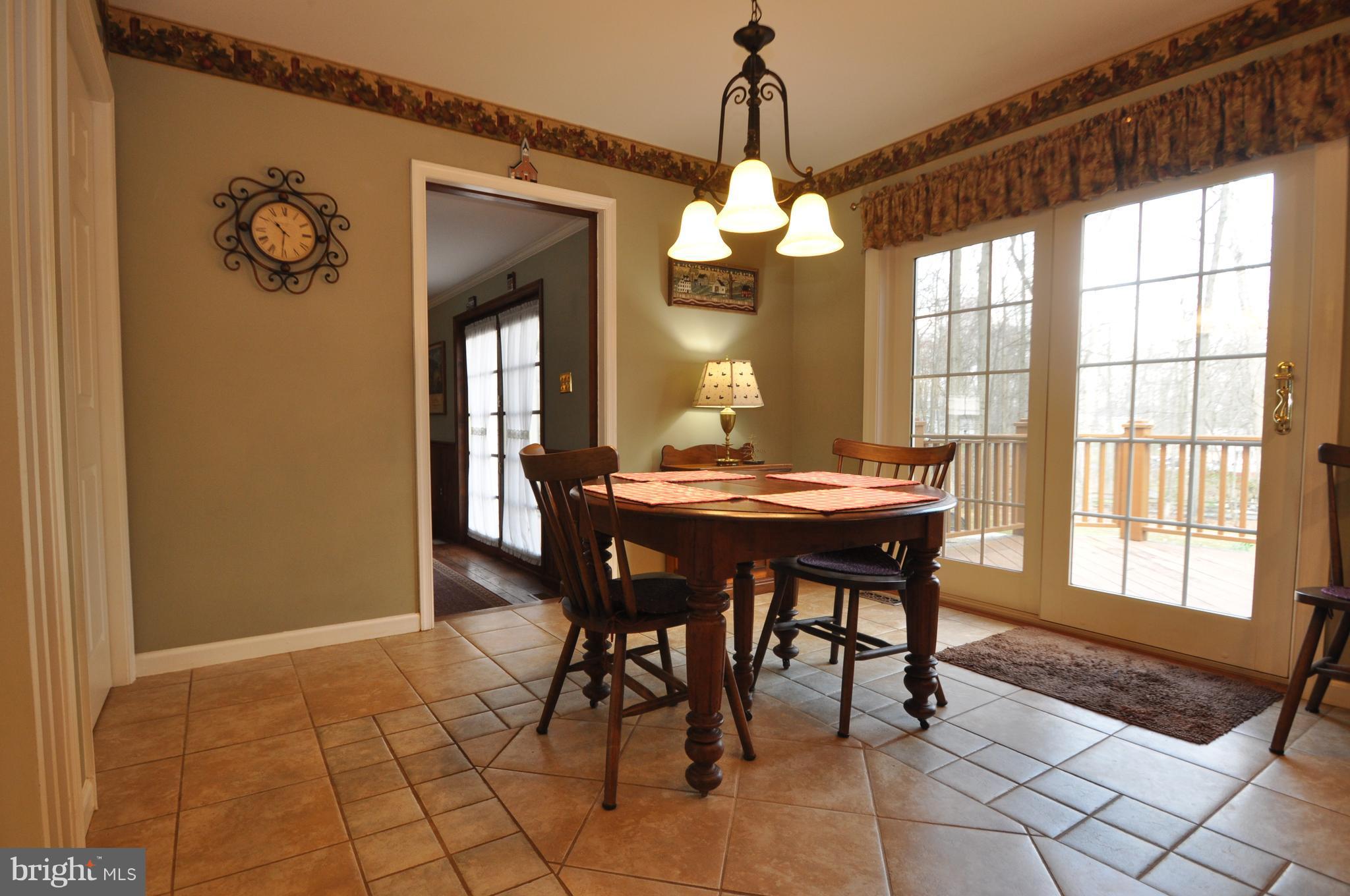 2412 Coon Club Road Westminster, MD 21157 - Photo 6 of 28 BRIGHT AND CHEERFUL EAT IN KITCHEN..