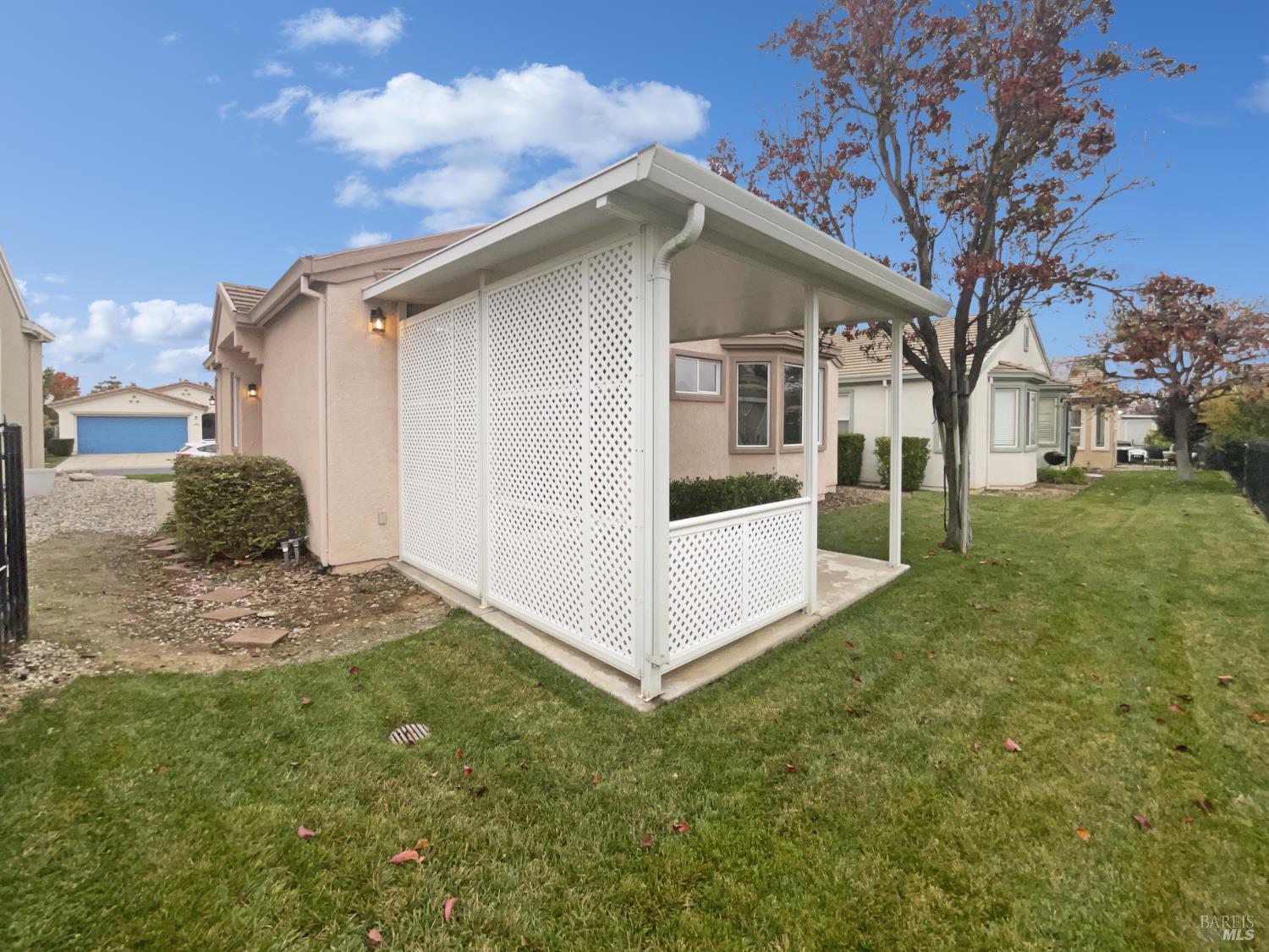 971 Bridgeport Way Rio Vista, CA 94571 - Photo 24 of 39 a white house that has tree in front of it