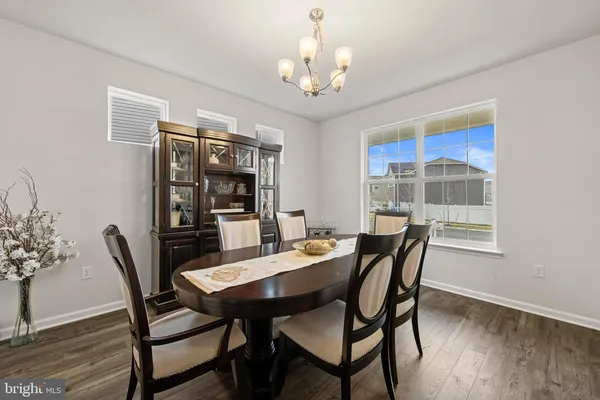 a utility room with stainless steel appliances and a sink