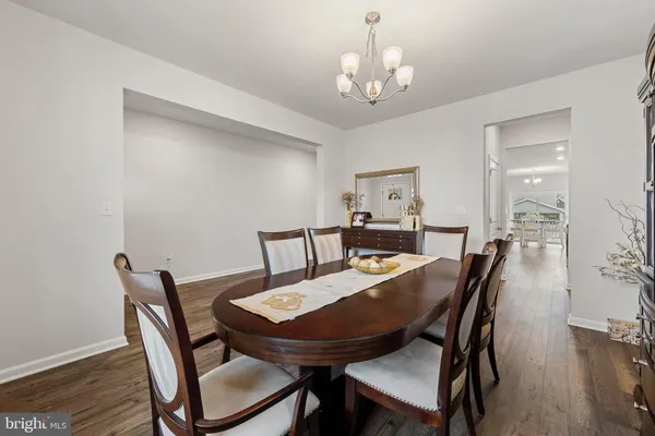 a living room with furniture or couch and a flat screen tv
