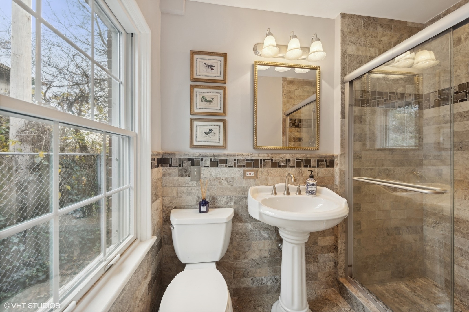 906 Harding Road Hinsdale, IL 60521 - Photo 16 of 31 a bathroom with a sink toilet and shower