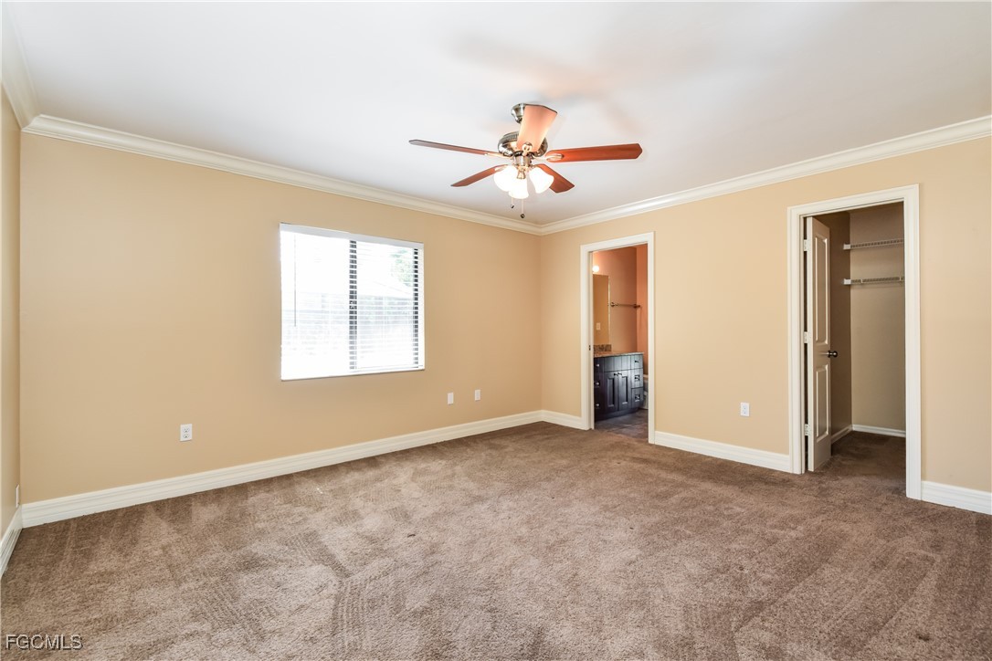 17365 Castile Road Fort Myers, FL 33967 - Photo 9 of 16 a view of an empty room with a window