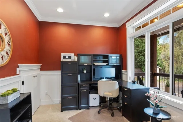 a workspace with furniture and a lamp