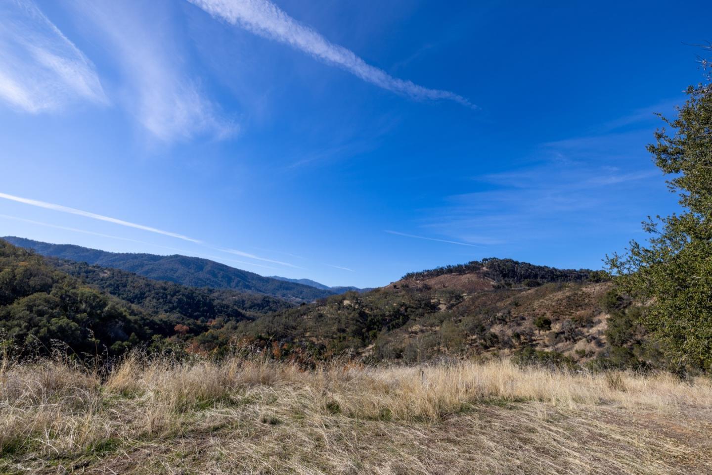 20803 Cachagua Road Carmel Valley, CA 93924 - Photo 6 of 21 a view of a lake with mountains in the background