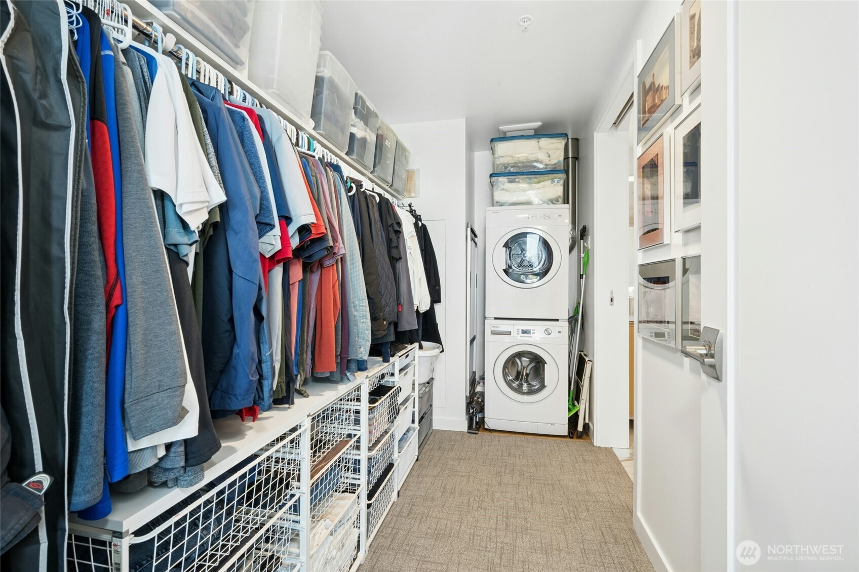 1808 Minor Avenue, Unit 3213 Seattle, WA 98101 - Photo 13 of 40 a view of walk in closet with clothes and shoes
