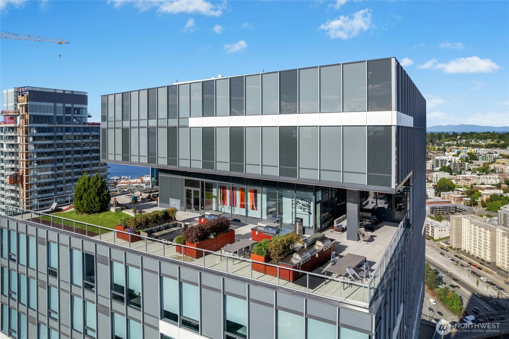 1808 Minor Avenue, Unit 3213 Seattle, WA 98101 - Photo 23 of 40 a view of a two chairs and table in a balcony