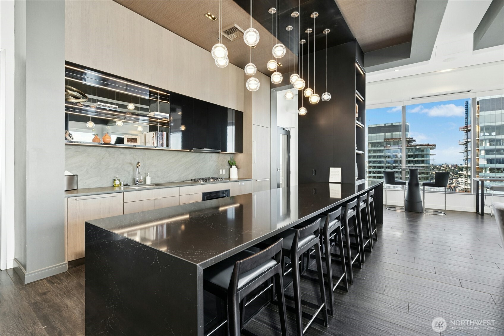 1808 Minor Avenue, Unit 3213 Seattle, WA 98101 - Photo 32 of 40 a kitchen with stainless steel appliances granite countertop a sink a stove and a refrigerator
