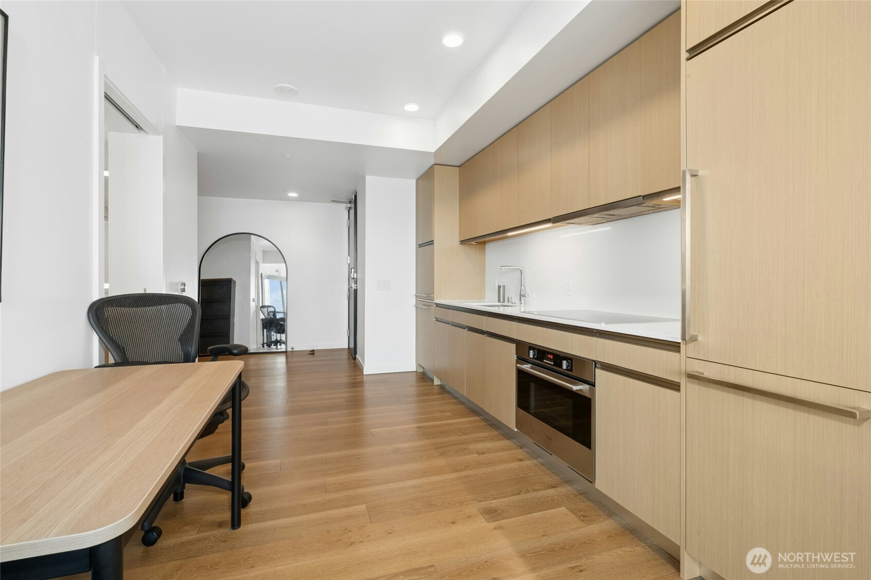 1808 Minor Avenue, Unit 3213 Seattle, WA 98101 - Photo 8 of 40 a view of kitchen with furniture and wooden floor