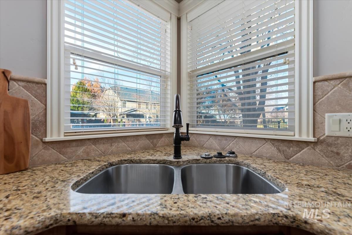 1082 East Azan Street Meridian, ID 83646 - Photo 9 of 47 Kitchen view of light stone counters