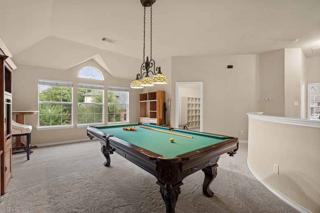 2703 Pottery Trail Corinth, TX 76210 - Photo 22 of 40 a room with pool table and windows