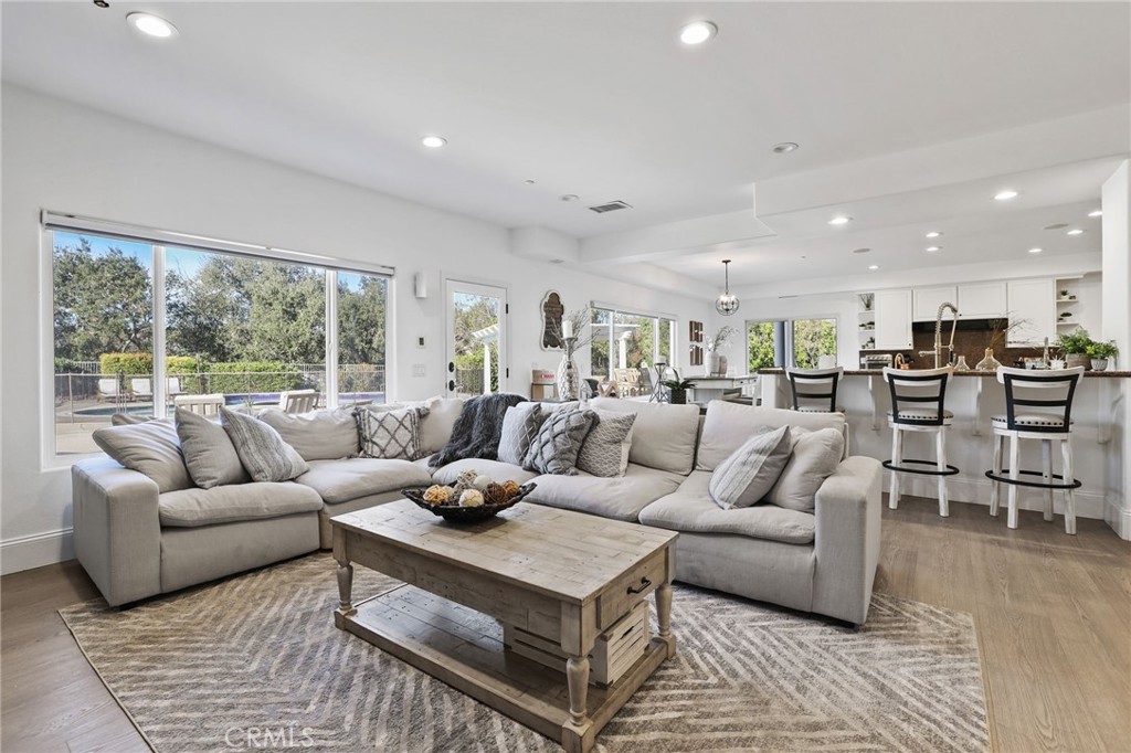 2 Olympic Way Coto de Caza, CA 92679 - Photo 16 of 75 a living room with furniture kitchen view and a large window