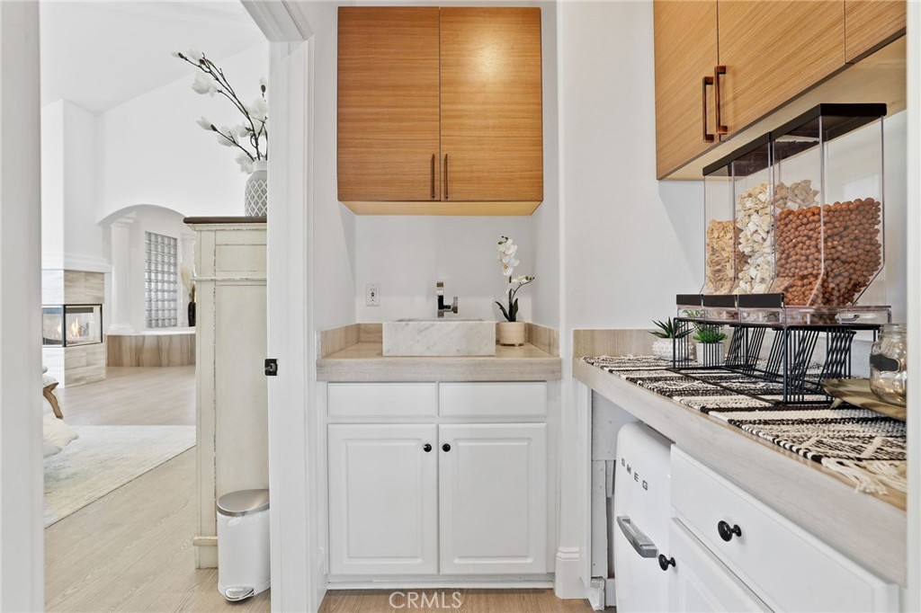 2 Olympic Way Coto de Caza, CA 92679 - Photo 34 of 75 a kitchen with stainless steel appliances granite countertop a sink and a stove