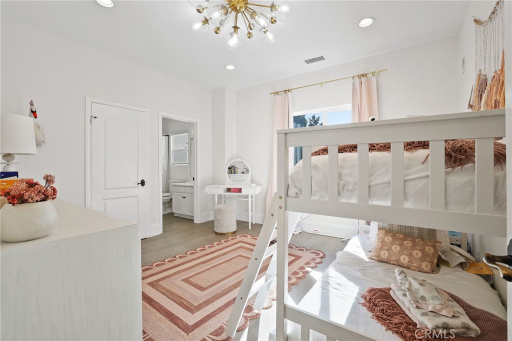 2 Olympic Way Coto de Caza, CA 92679 - Photo 39 of 75 a living room with furniture and a chandelier