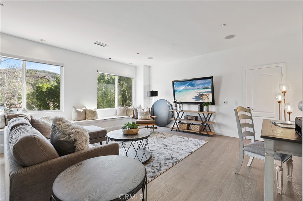 2 Olympic Way Coto de Caza, CA 92679 - Photo 42 of 75 a living room with furniture and a large window